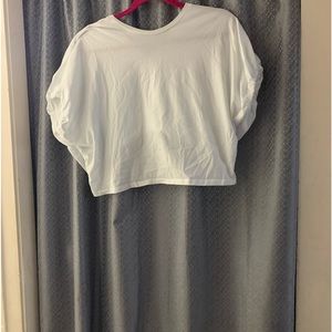 ZARA 2 tops x $10 1)is 100% cotton,elastic on the back sleeves 2) ruched sleeves